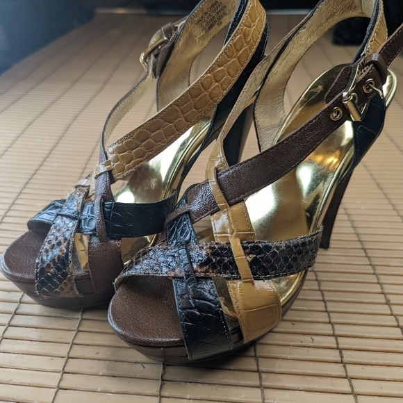 Michael Kors Shoes - Michael Kors women's sz 7M platform sandal 4.5" heels. Black and brown leather.